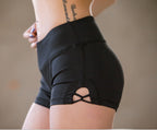 Original spring and summer new tight buttocks YOGA SHORTS dynamic single car cross hollowed out shorts